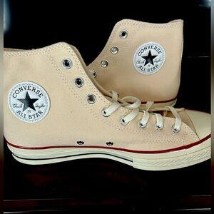 Never worn. Perfect condition. Tan converse. Woman’s 11.5 or men’s 9.5